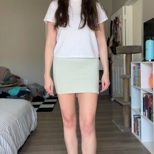 Pastel green mini skirt with elastic waistband